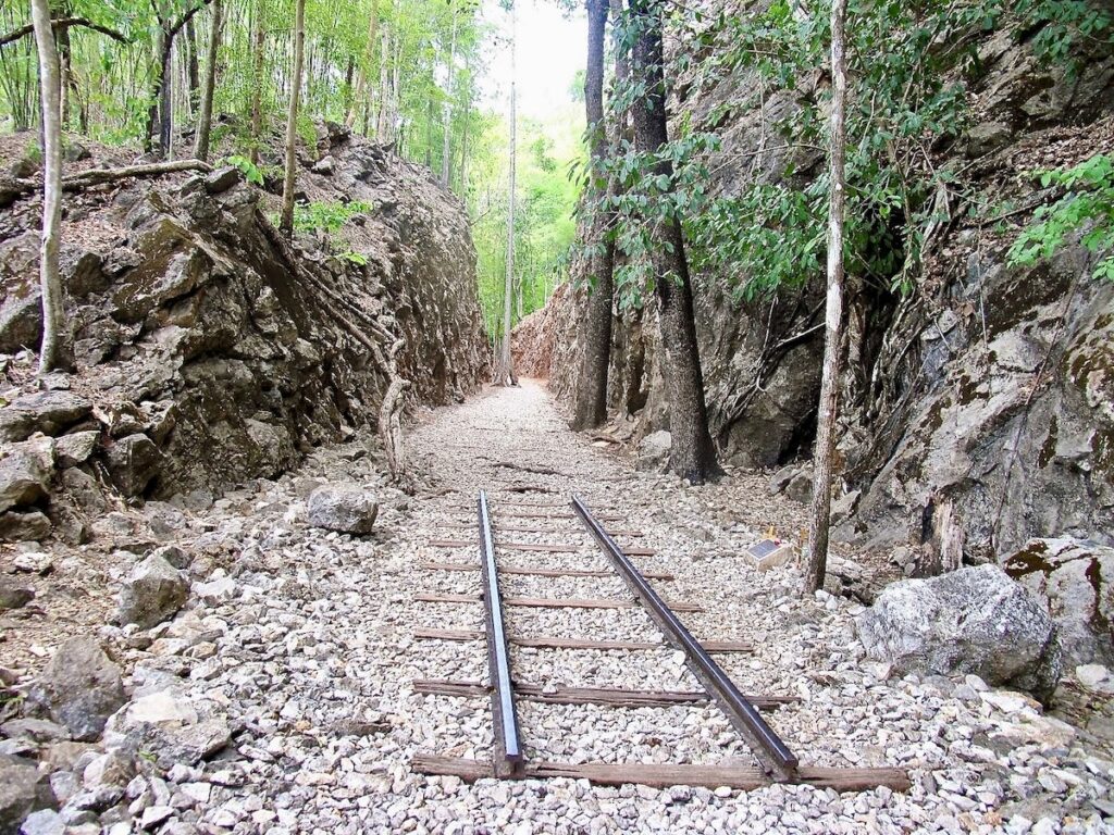 Railway track and sleepers laid through the rock cutting at Hellfire Pass